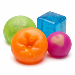 NeeDoh squeeze balls on white: classic, colour changing, a Nice Cube and a Cool Cats figure