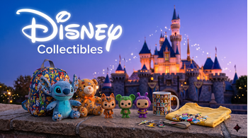 Disney collectibles at Techbox: Stitch plush, Winnie the Pooh, Funko POP, mug and backpack in front of illuminated castle